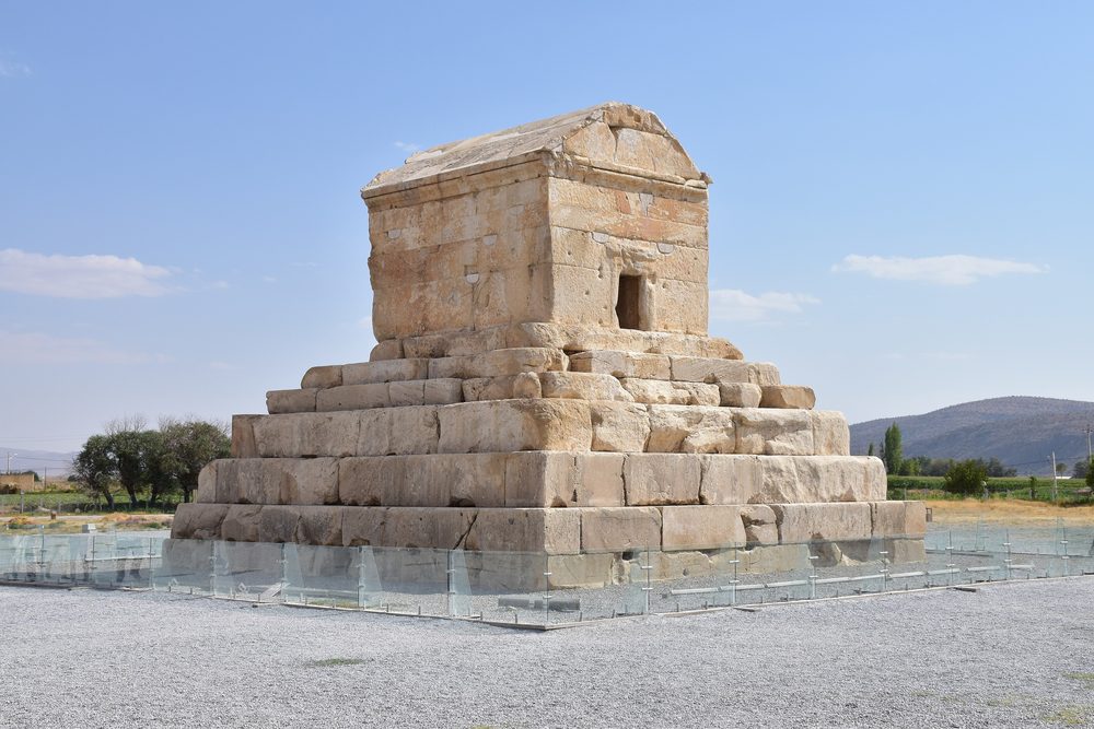 The conqueror who wanted the world got a stone chamber at Pasargadae — and, if the queen kept her word, his head returned in a skin of blood.
